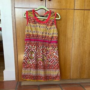 Cute super lightweight summer dress. NOT see through. Fun material.
